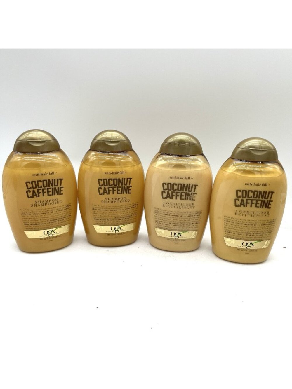 Lot Of 4 Ogx anti-hair fall + coconut caffeine Shampoo and Conditioner 13oz ea